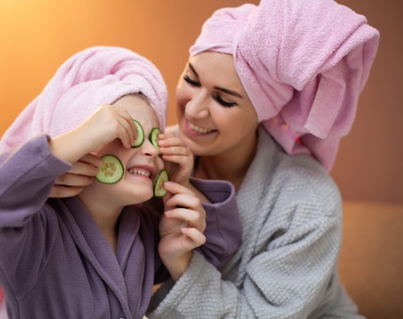 Mom and daughter doing spa treatments at home. Mom and daughter doing spa treatments at home